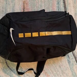 Nike Men's Black Backpack with Gold Accents